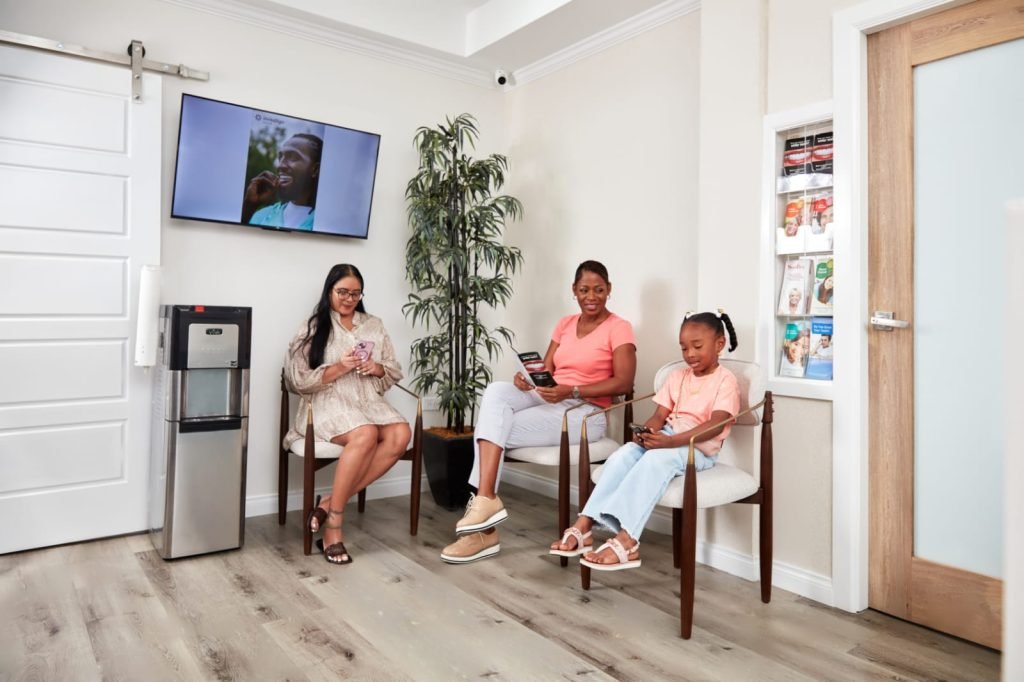 Family in waiting room - 868 Dental Studio